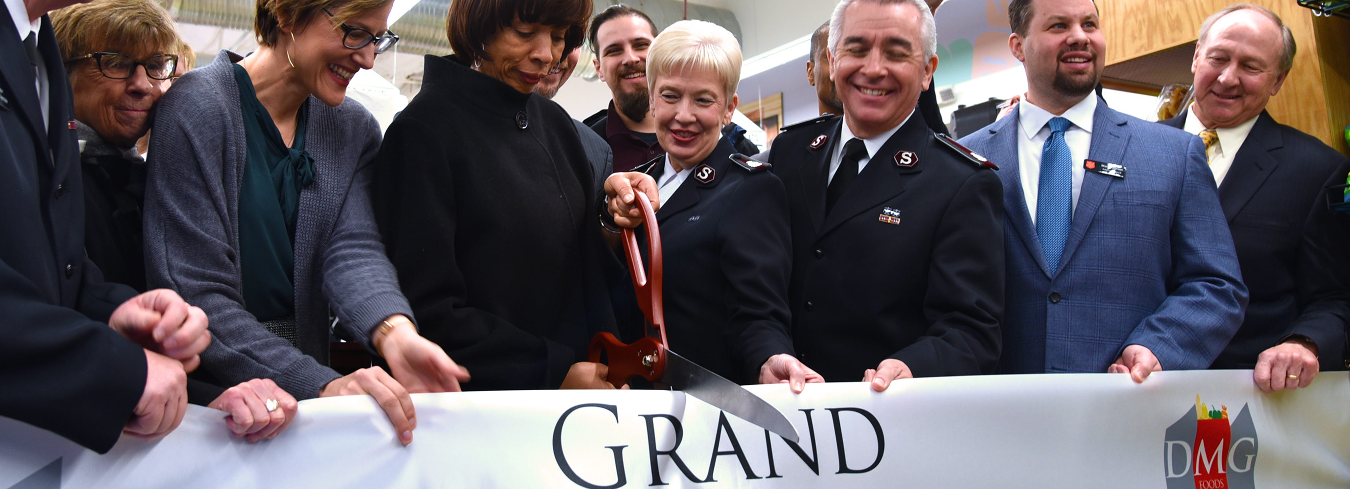 Ribbon cutting at the first DMG Foods in Baltimore