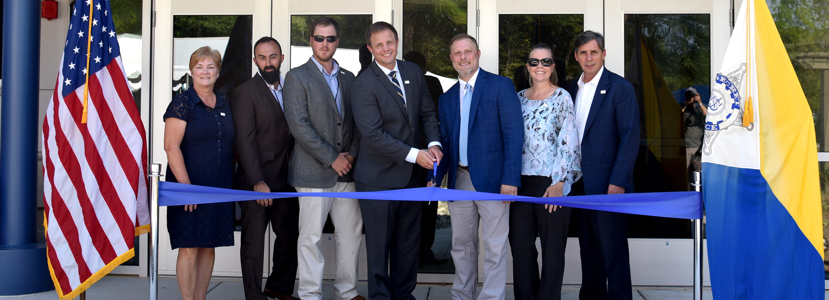 Harkins team cuts ribbon on canine training facility