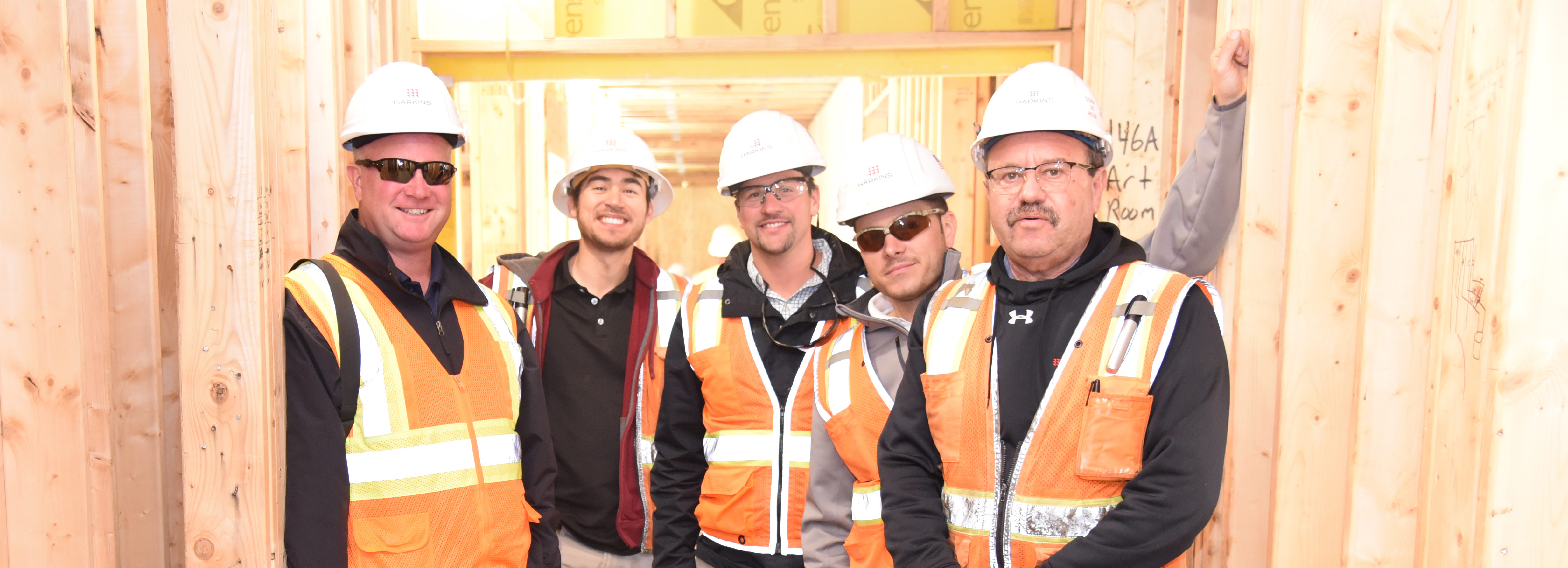 Group photo topping out construction framing