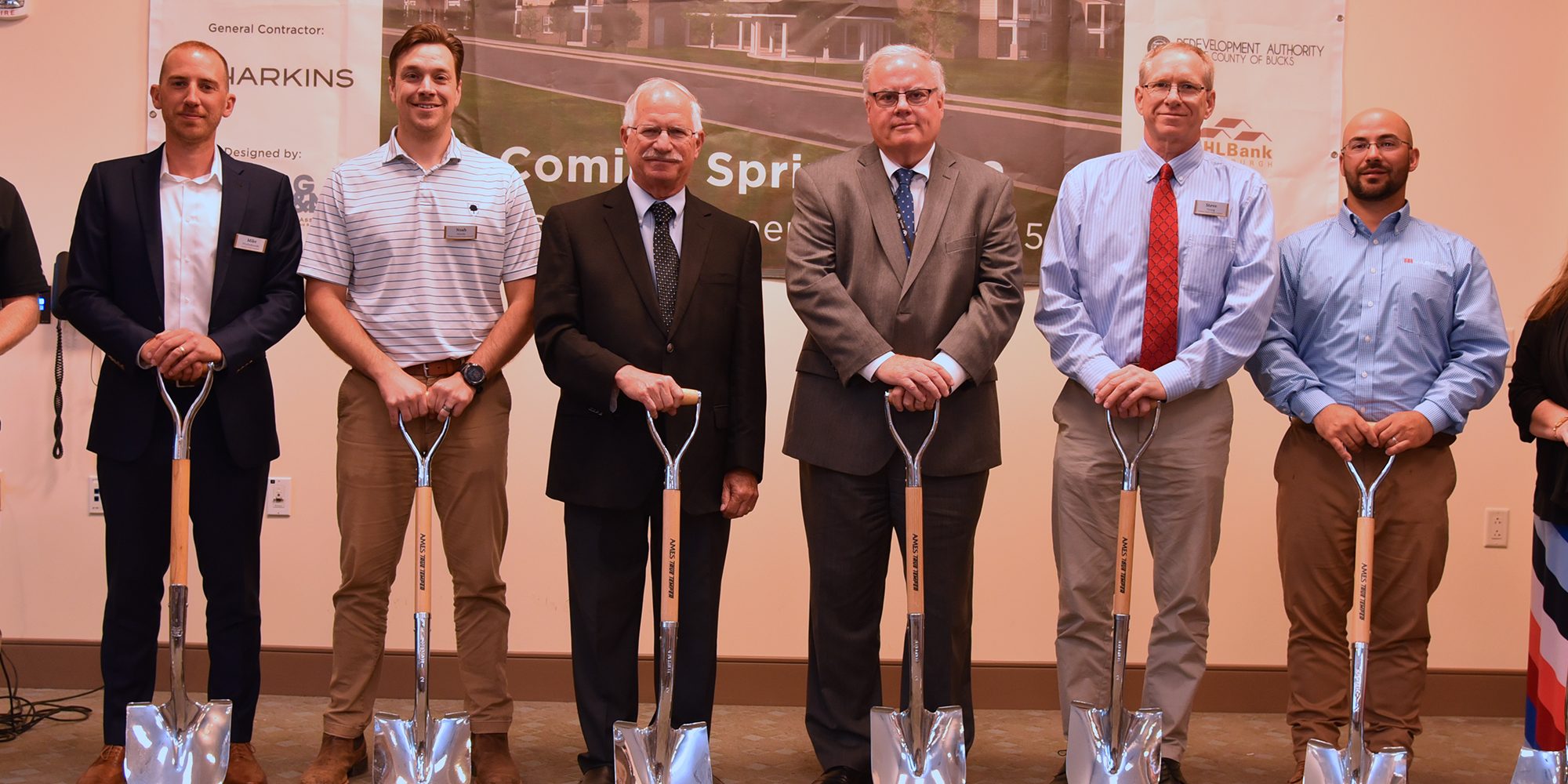 Harkins Members standing side by side at the Sellersville Groundbreaking with shovels in hand.